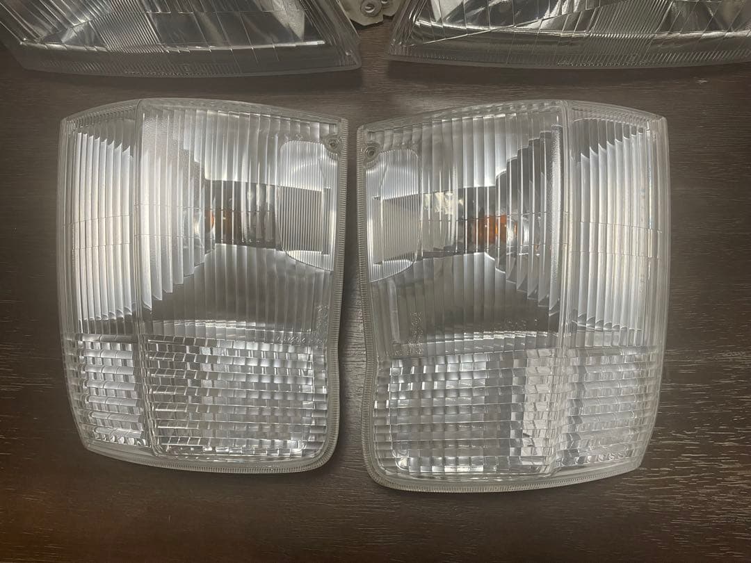 キャラバン前期 純正品コーティング加工済ヘッドライトコーナーレンズ4点セット