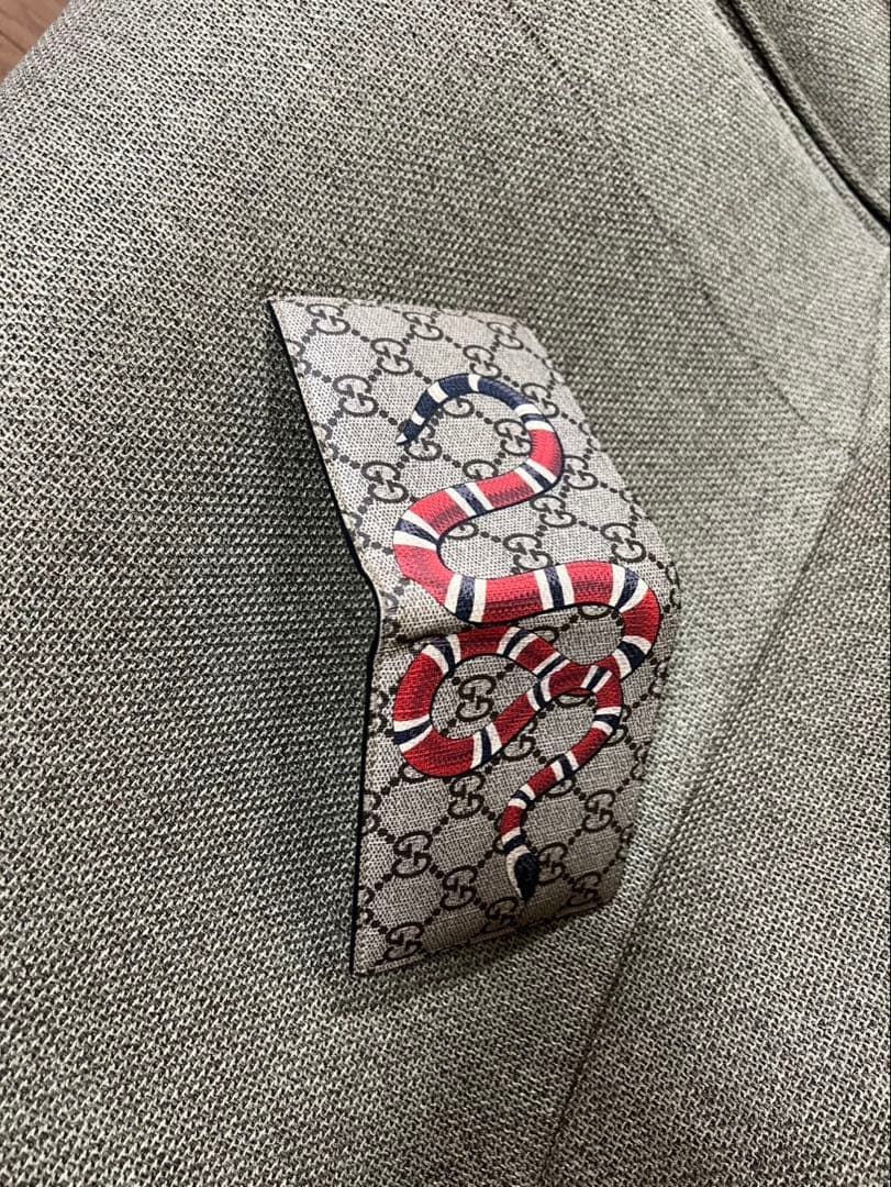 Gucci 二つ折り財布 GGパターン 蛇
