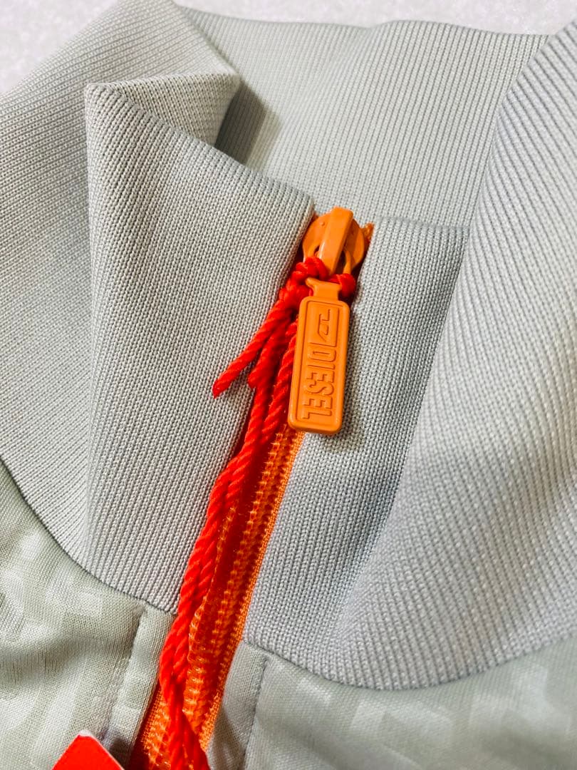 8437. 【未使用タグ付き】DIESEL 総柄トラックジャケット