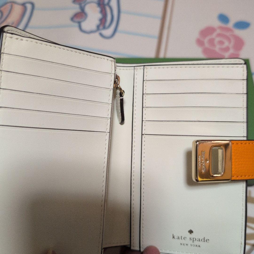 kate spade オレンジ 二つ折り財布