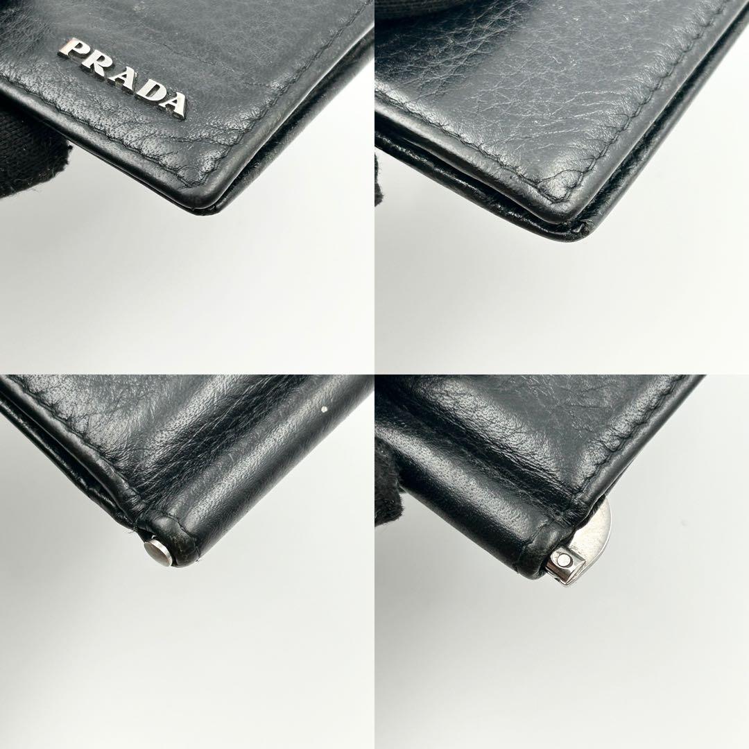 PRADA マネークリップ 折り財布 二つ折り ロゴ シルバー金具 シボ革 黒