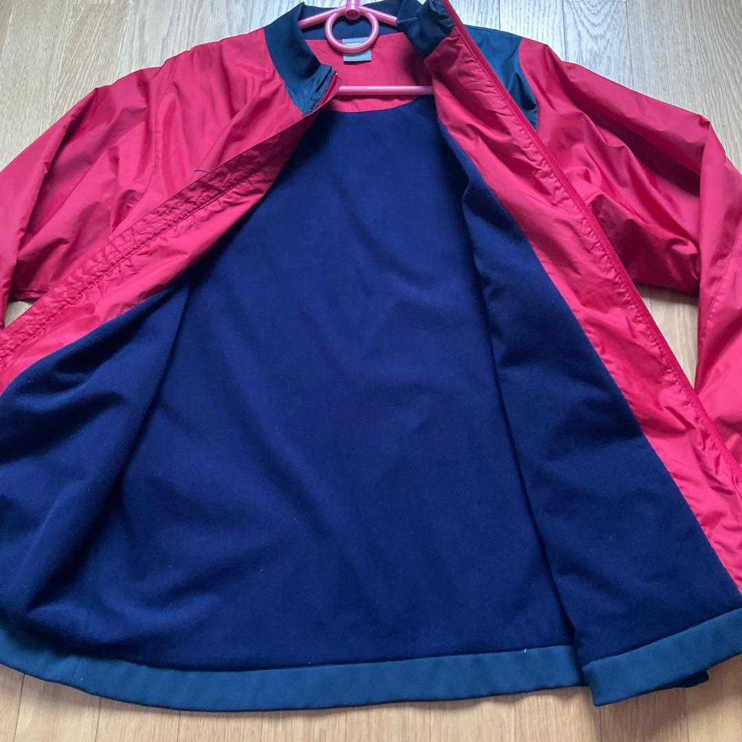 鹿島アントラーズNike ピステ・ウィンドブレーカー レッド/ネイビー