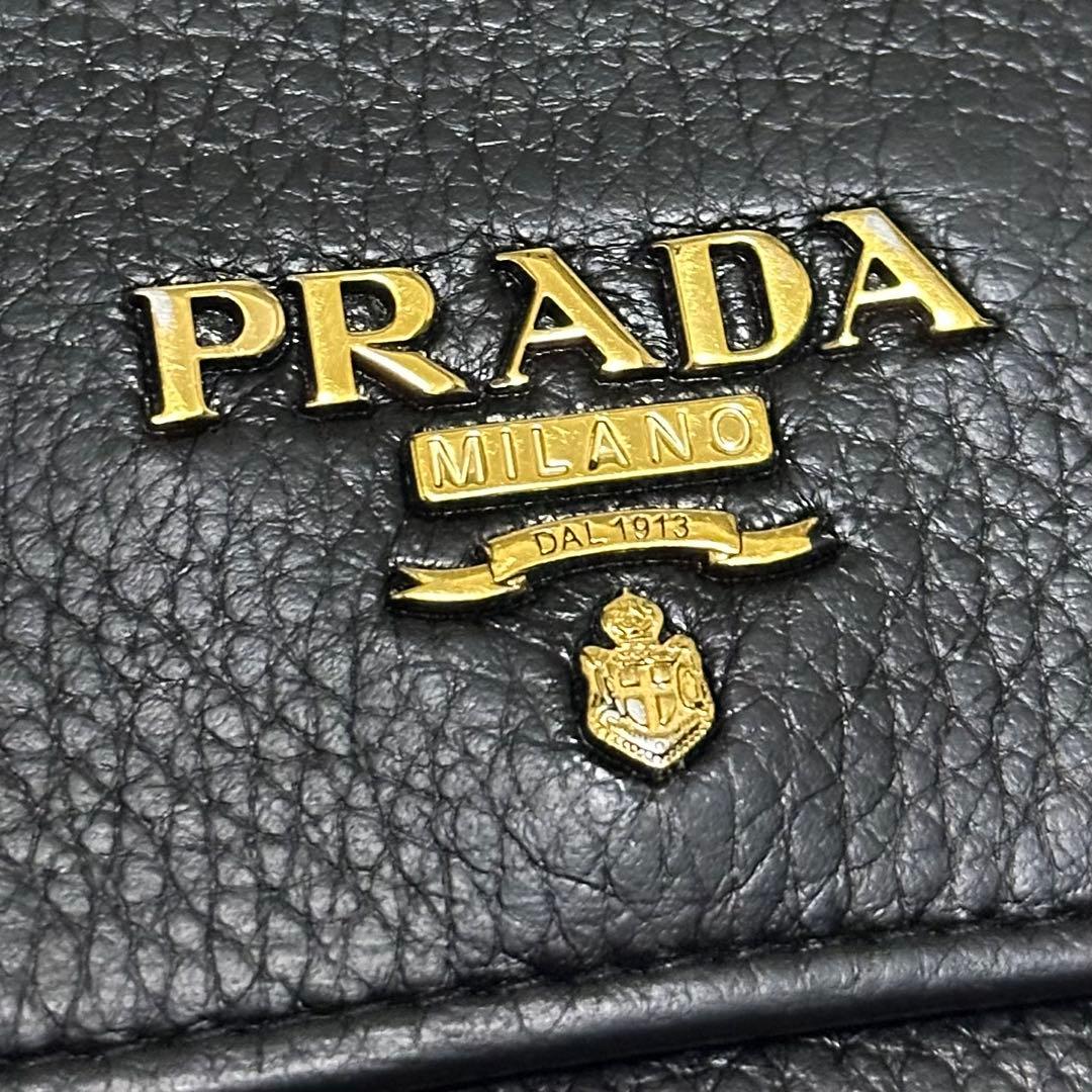 PRADA プラダ　長財布　ゴールドロゴ　シボ革　ブラック