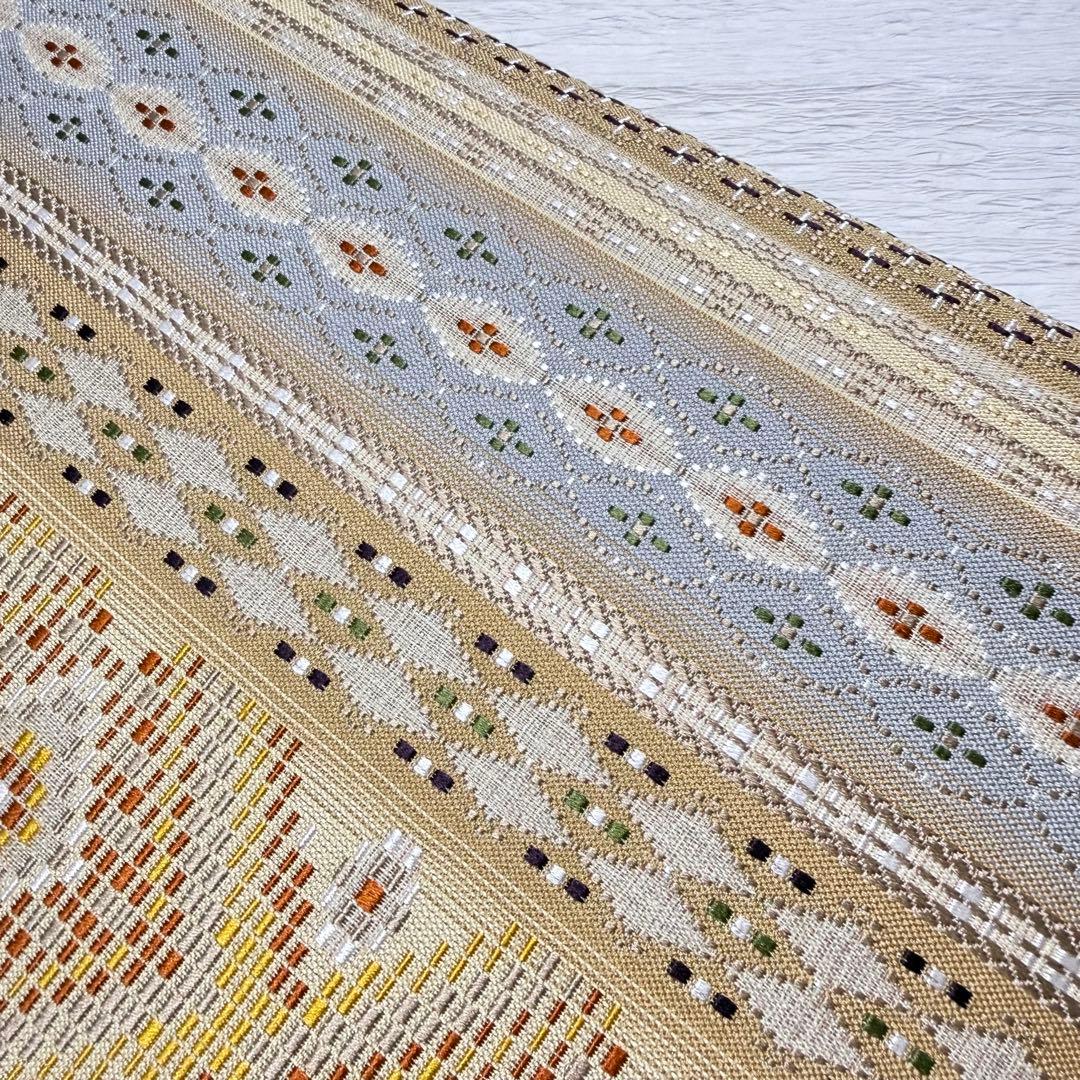 m-22 本場琉球 島花織 幻想雪輪文 袋帯 正絹 2通り 両面 未使用