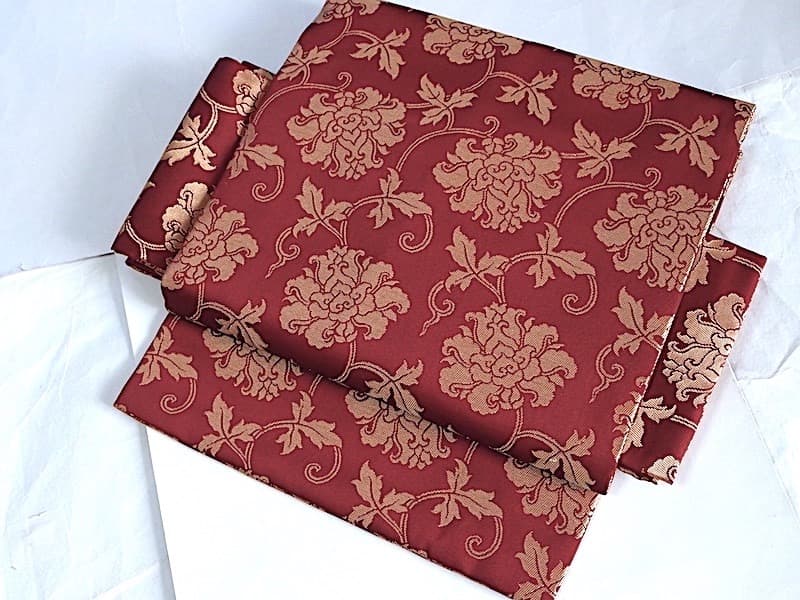 織りの九寸名古屋帯（牡丹唐草文）正絹美品