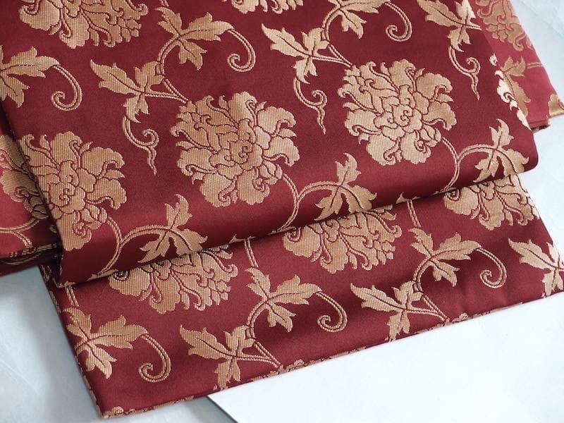 織りの九寸名古屋帯（牡丹唐草文）正絹美品