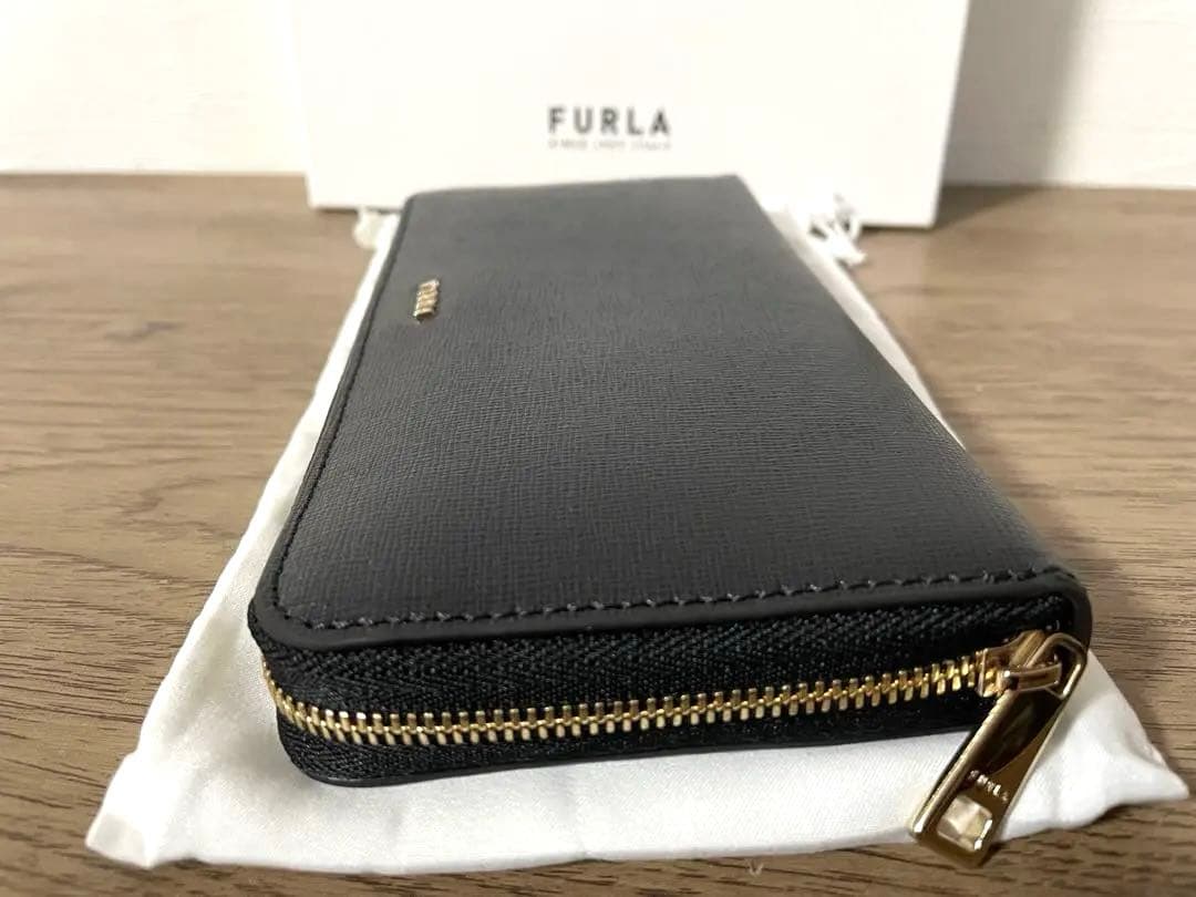 新品同様FURLA ブラックレザー長財布