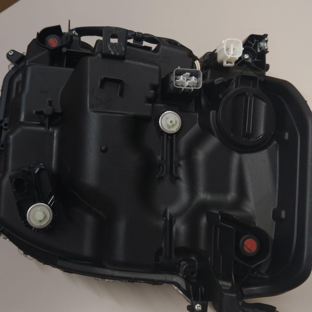 ムーヴキャンバス850s左ヘッドランプ