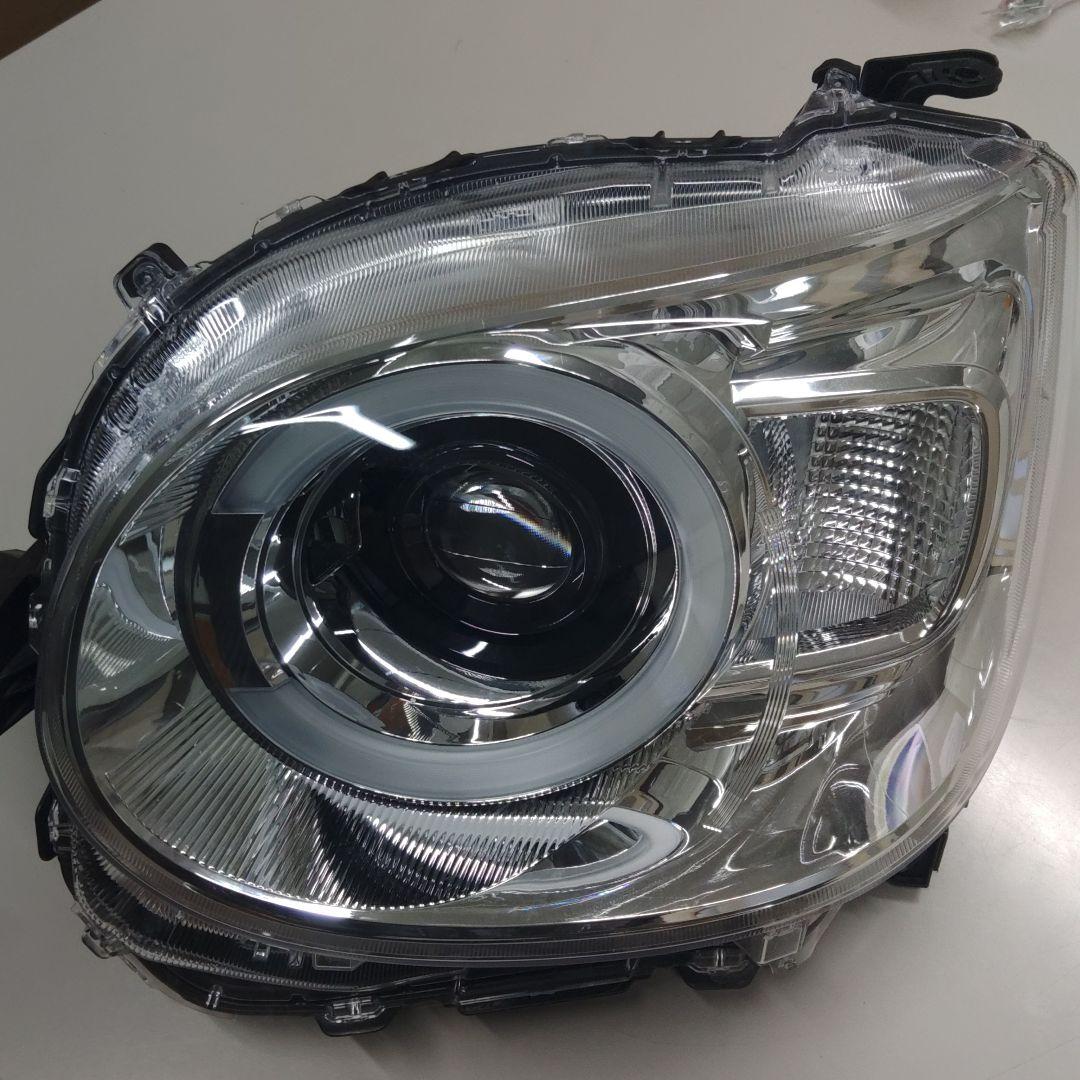 ムーヴキャンバス850s左ヘッドランプ