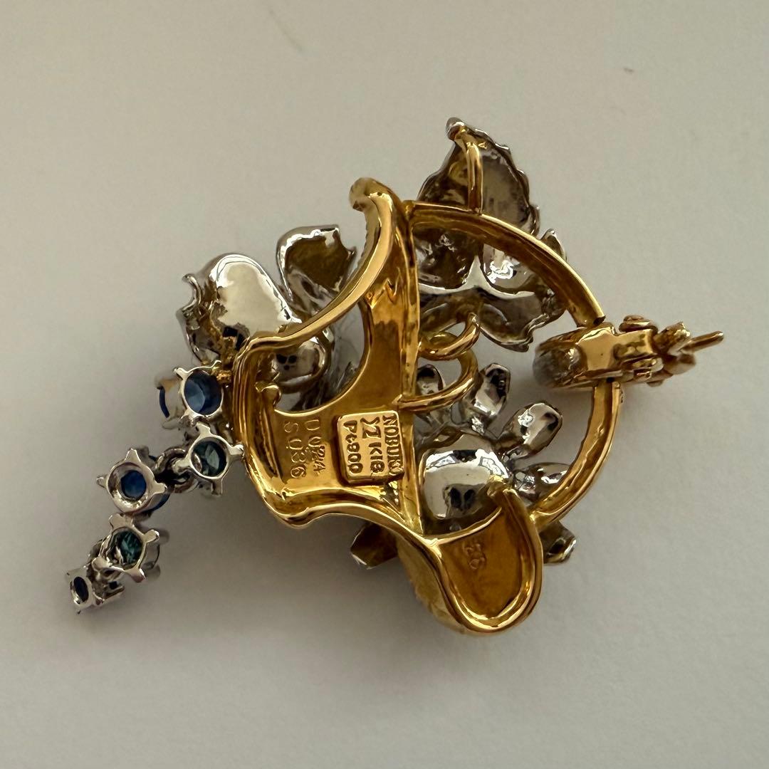 石川暢子ペンダントトップpt900K18ダイヤ0.24サファイヤ0.36ct