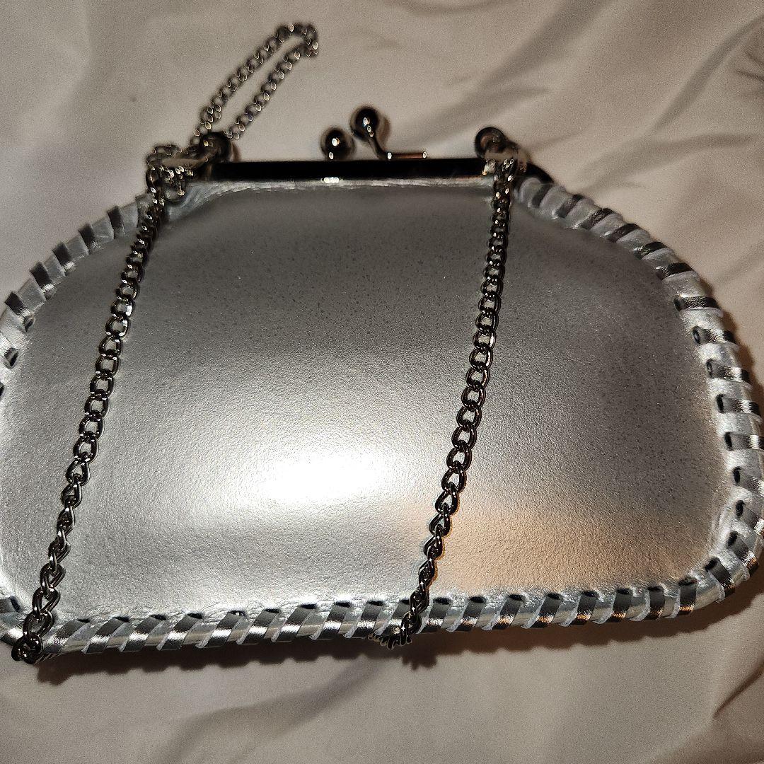 カービングトライブスがま口ショルダーバッグ