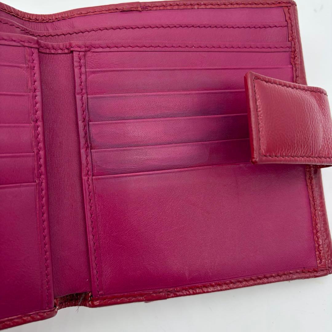 イヴサンローラン 二つ折り財布 カサンドラ YSLロゴ パテントレザー ピンク