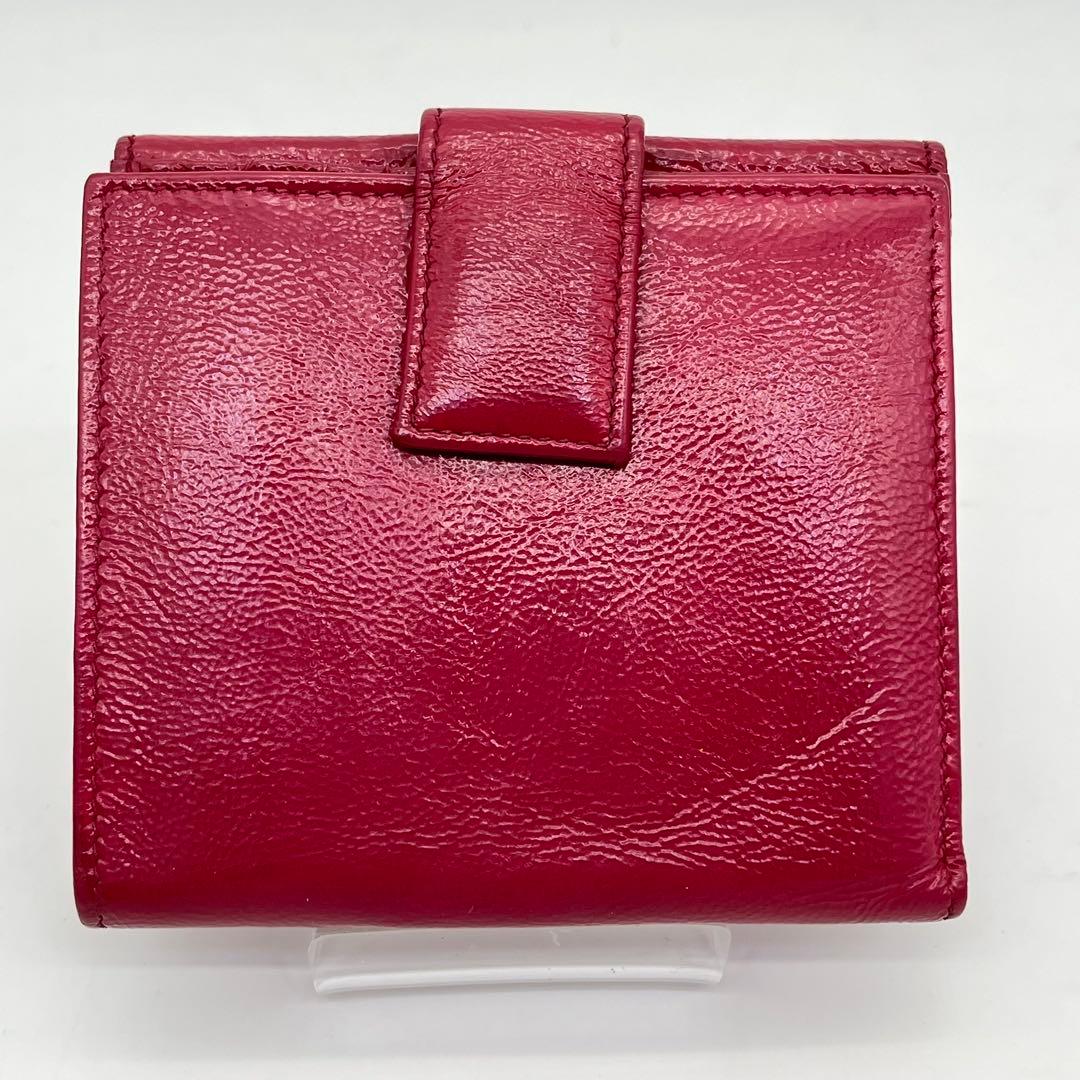 イヴサンローラン 二つ折り財布 カサンドラ YSLロゴ パテントレザー ピンク