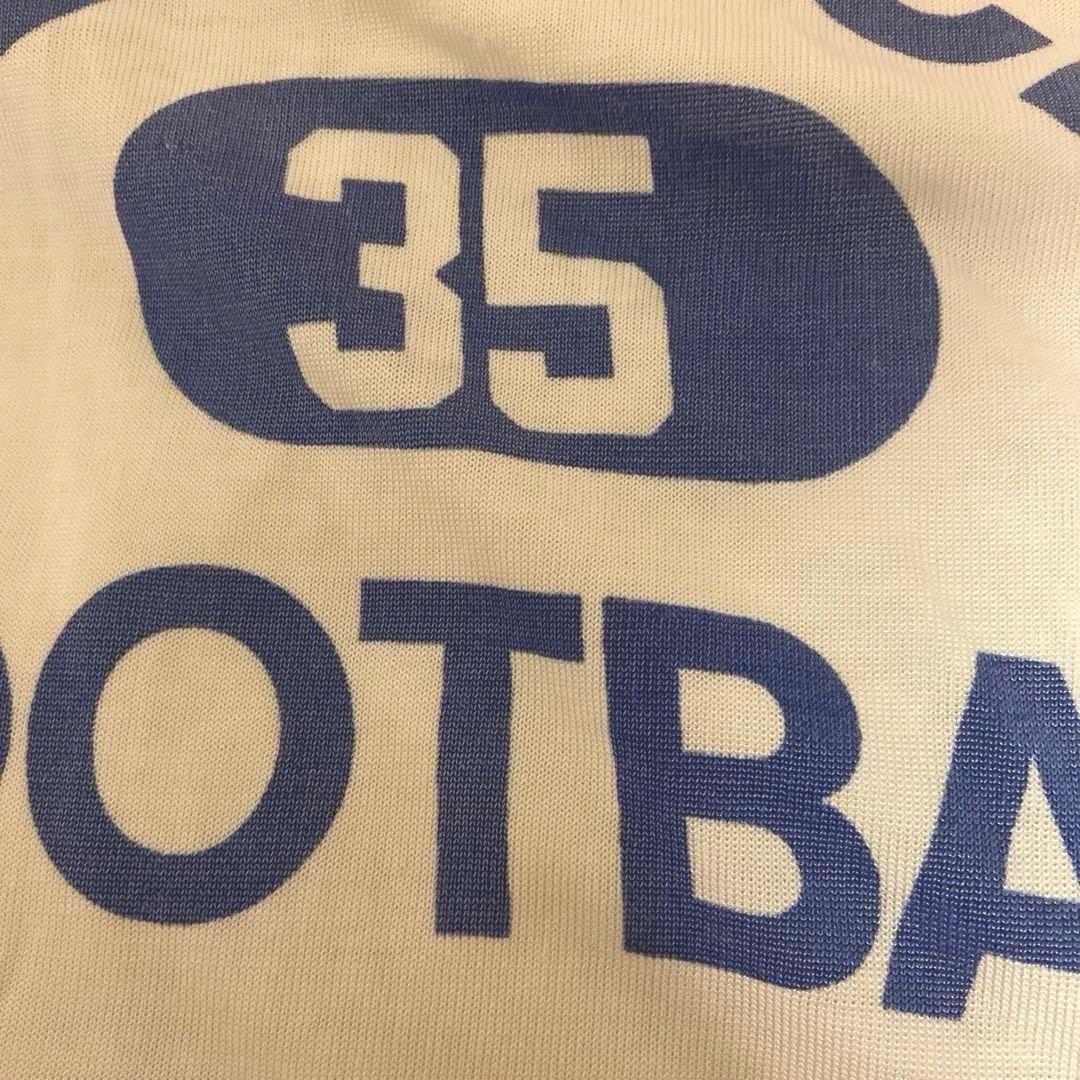 ヴィンテージ フットボール シャツhooked jantiques toro