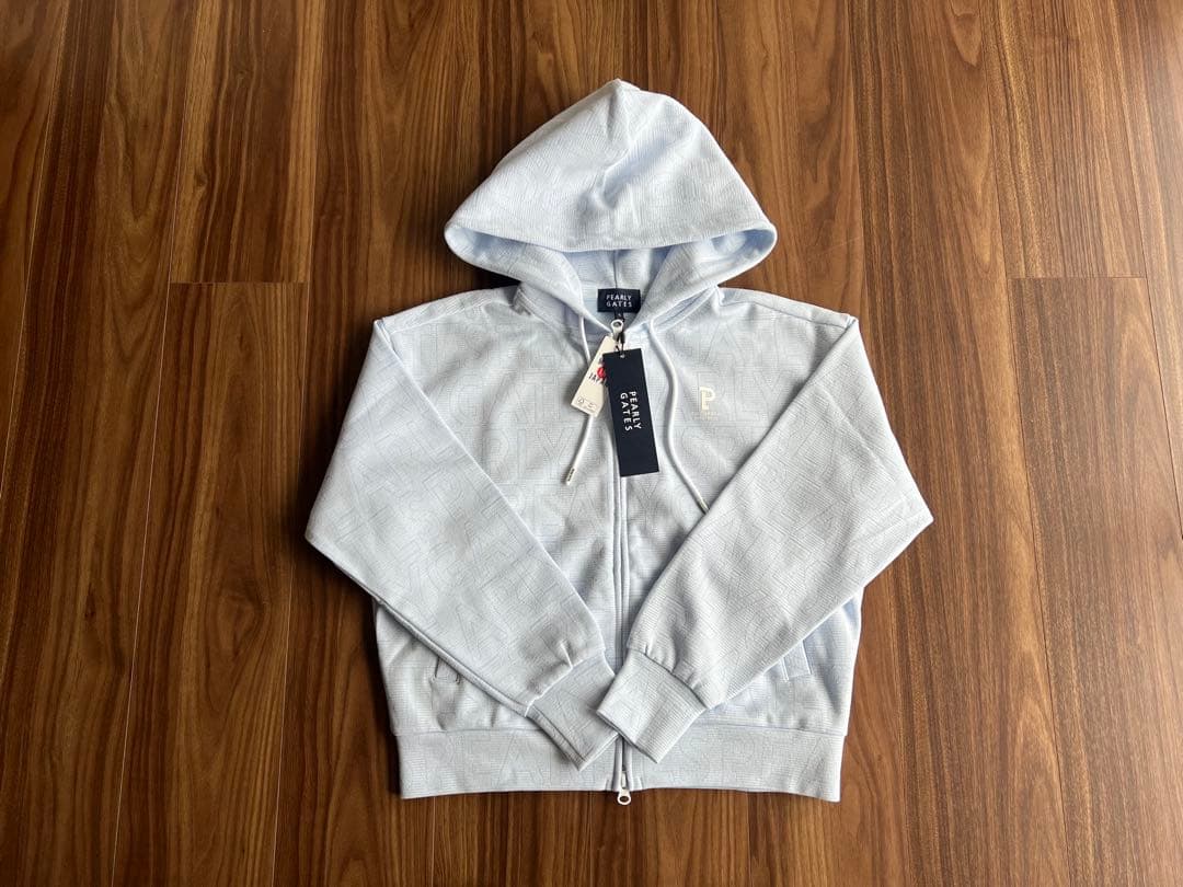 【新品タグ付き】パーリーゲイツ 総柄ロゴフルジップダンボールパーカー