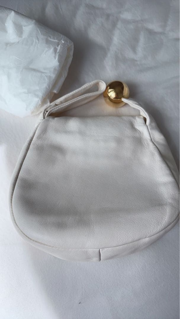 Jil Sander（ジル・サンダー）のホワイトクラッチバッグ /エッグシェル