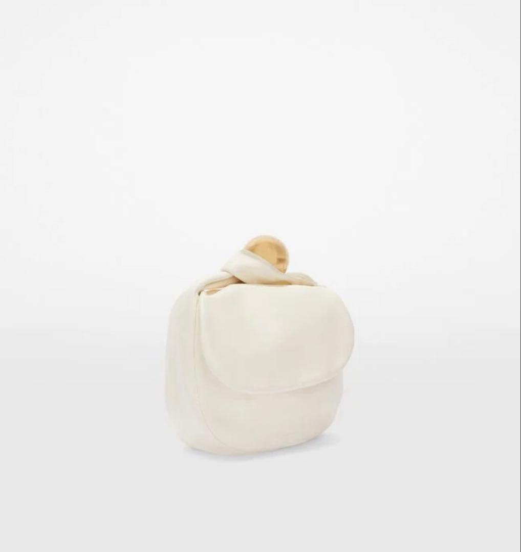 Jil Sander（ジル・サンダー）のホワイトクラッチバッグ /エッグシェル