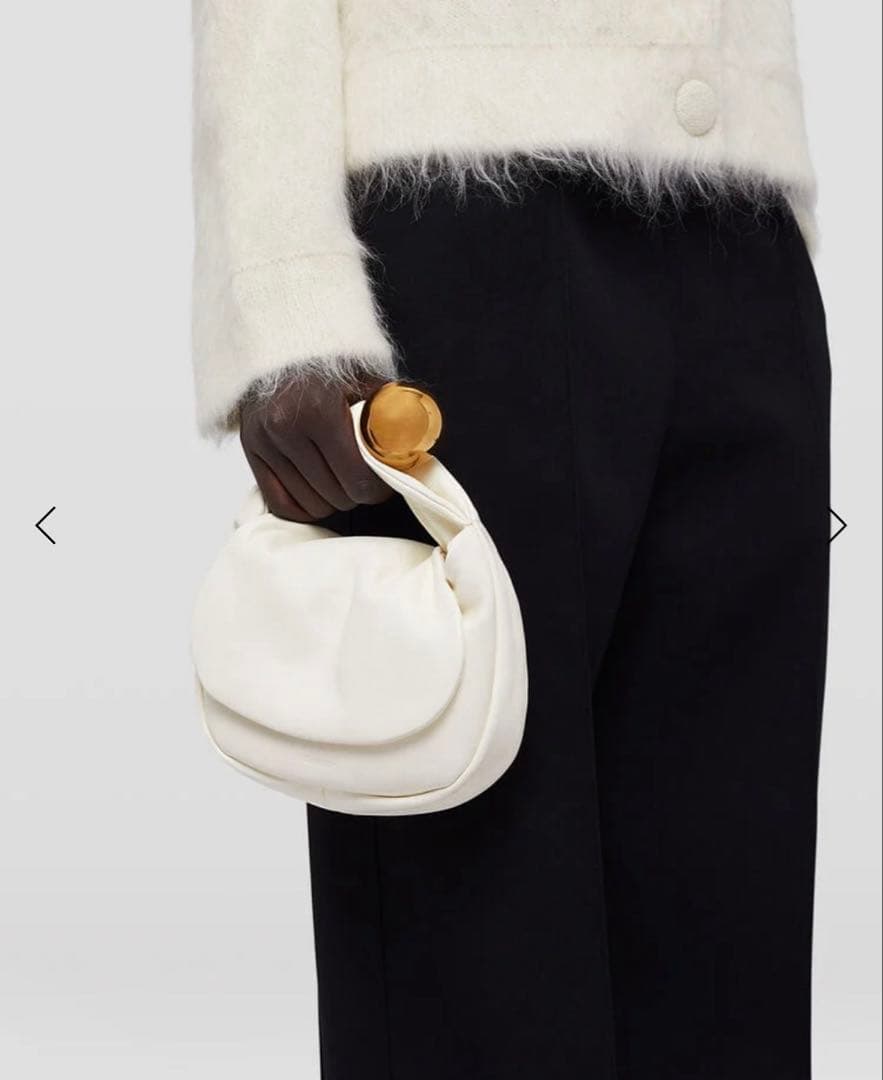 Jil Sander（ジル・サンダー）のホワイトクラッチバッグ /エッグシェル