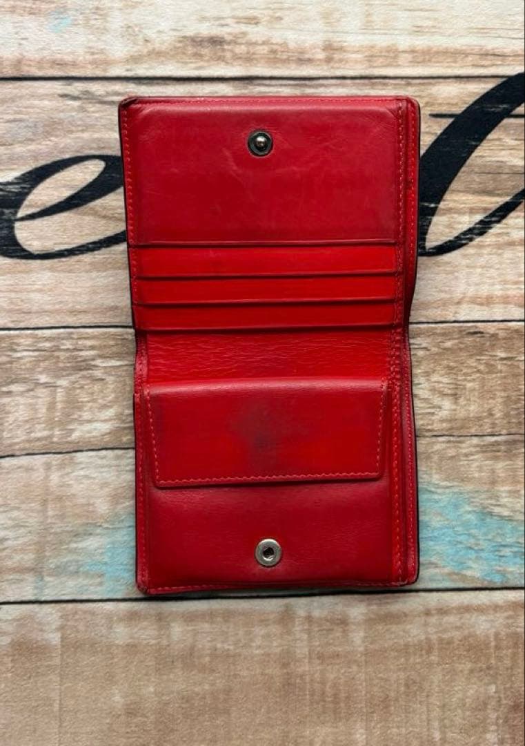 ✨人気✨　ルブタン スタッズ 二つ折り財布 黒 レッド