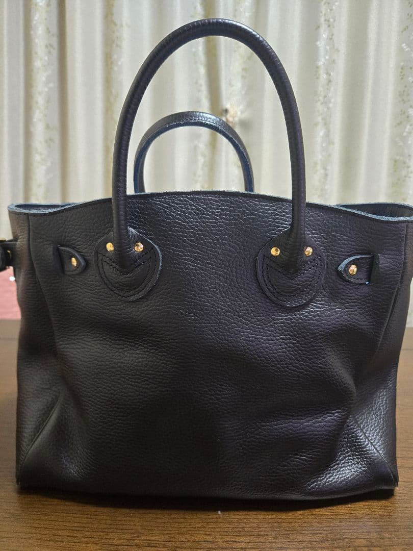 バッグ EMBOSSED LEATHER BELTED TOTE S 25AW