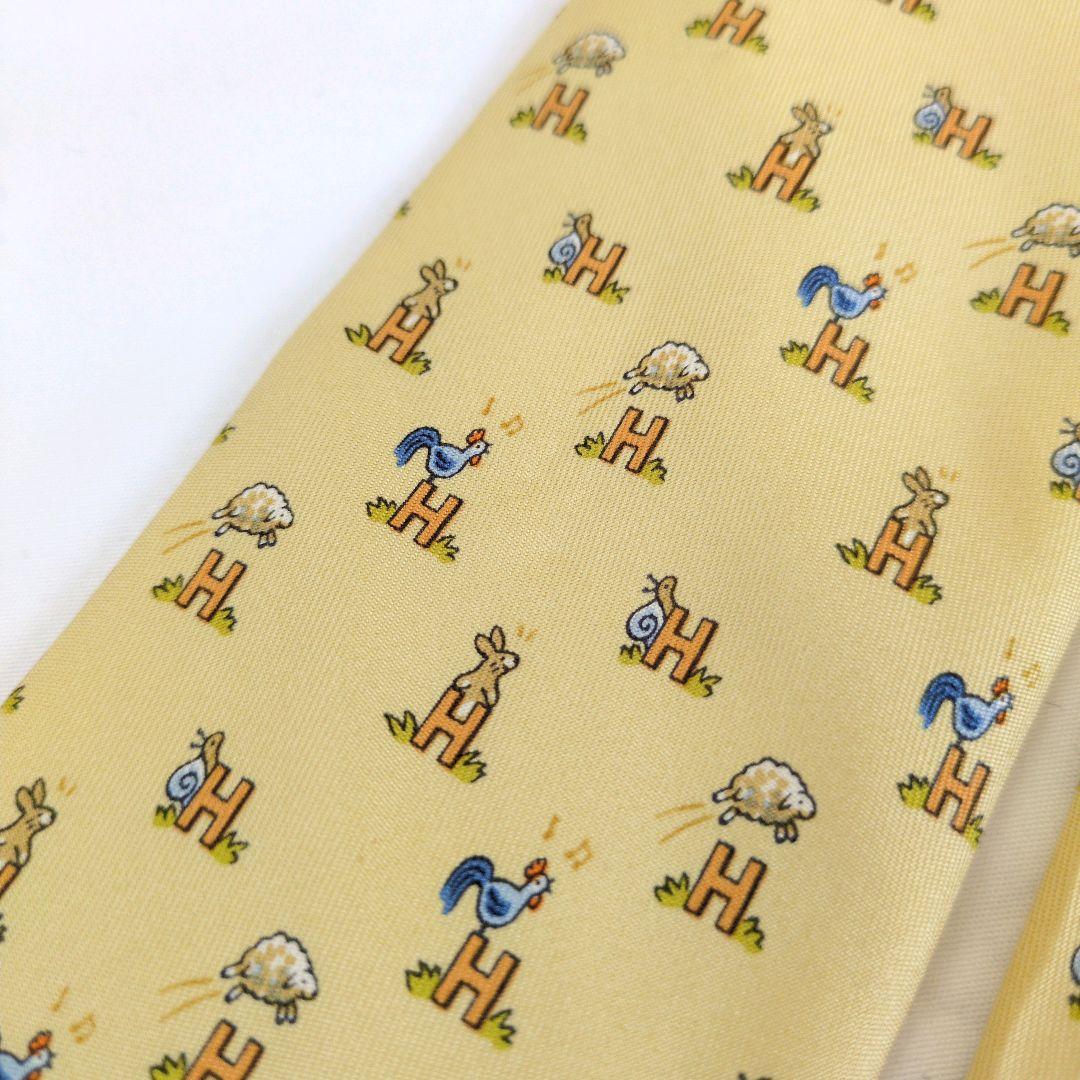 【美品】エルメス ネクタイ イエロー・オレンジ H柄 動物柄【フランス製】