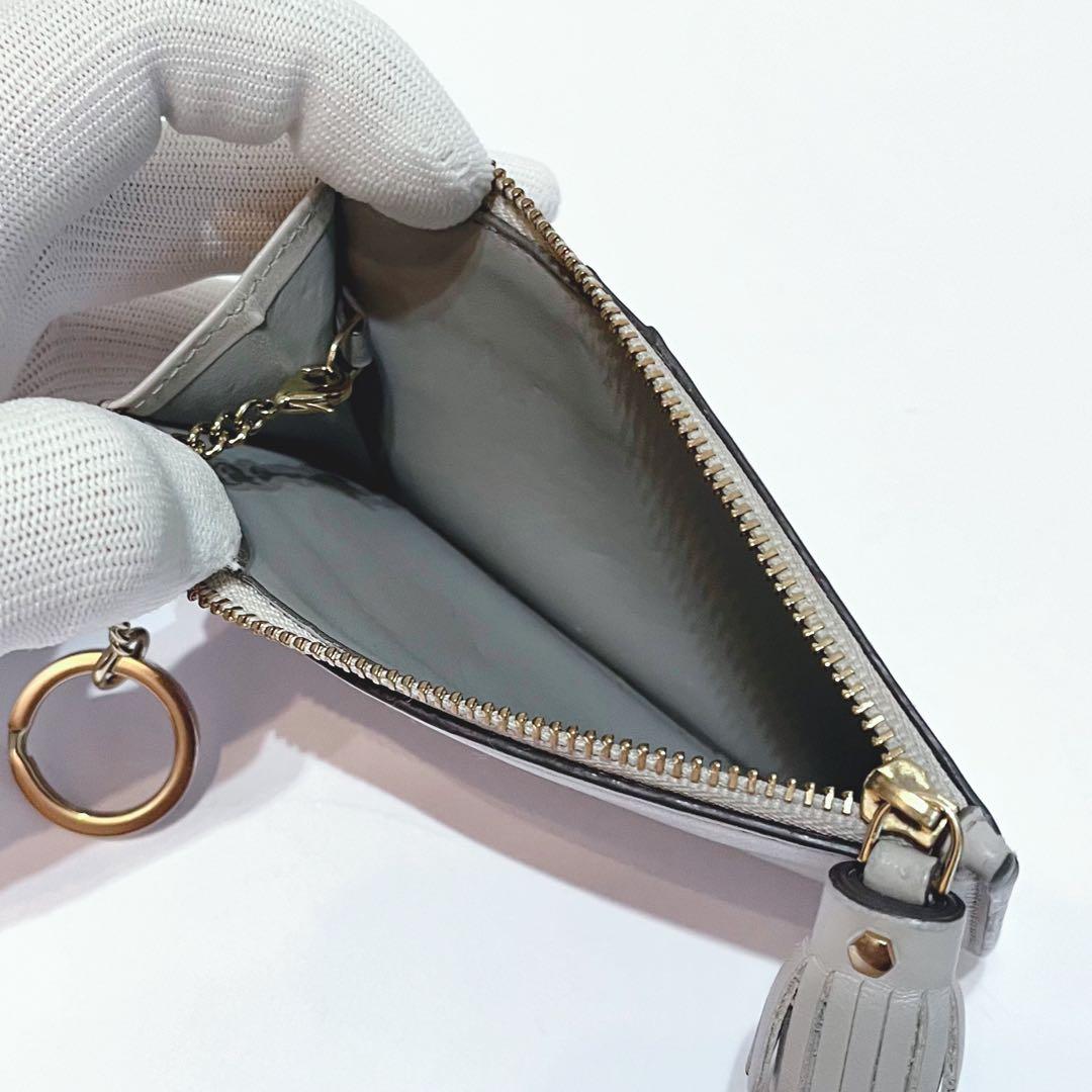 ANYA HINDMARCH スマイリーウィンキー パンチングレザーケース