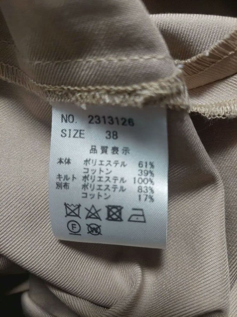 ラリアムーフード付きベージュコート