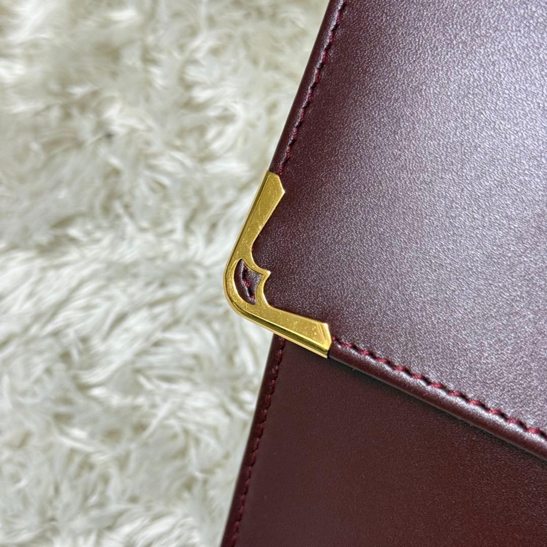 カルティエ　Cariter　マストライン　クラッチバッグ　ボルドー　ロゴ金具