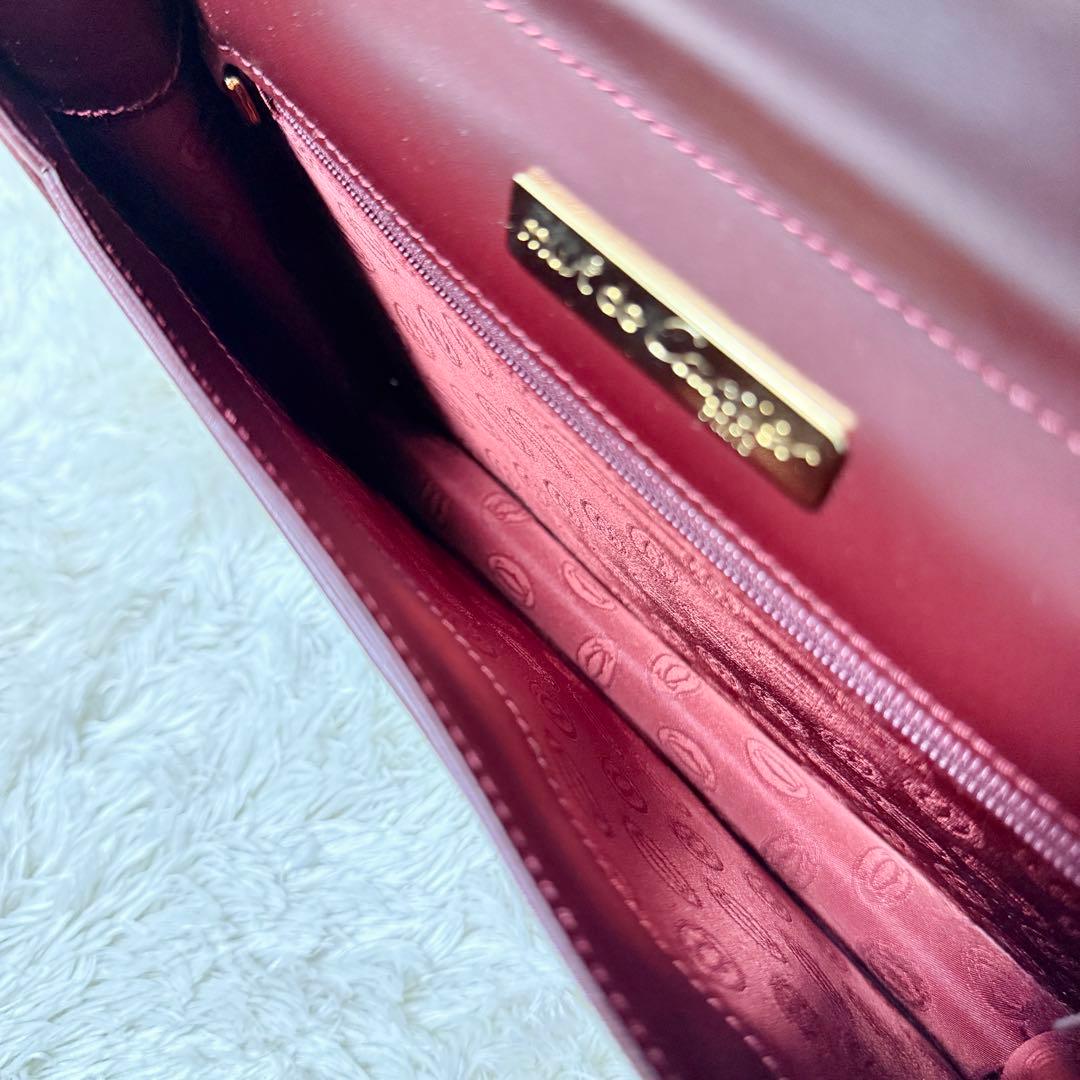 カルティエ　Cariter　マストライン　クラッチバッグ　ボルドー　ロゴ金具