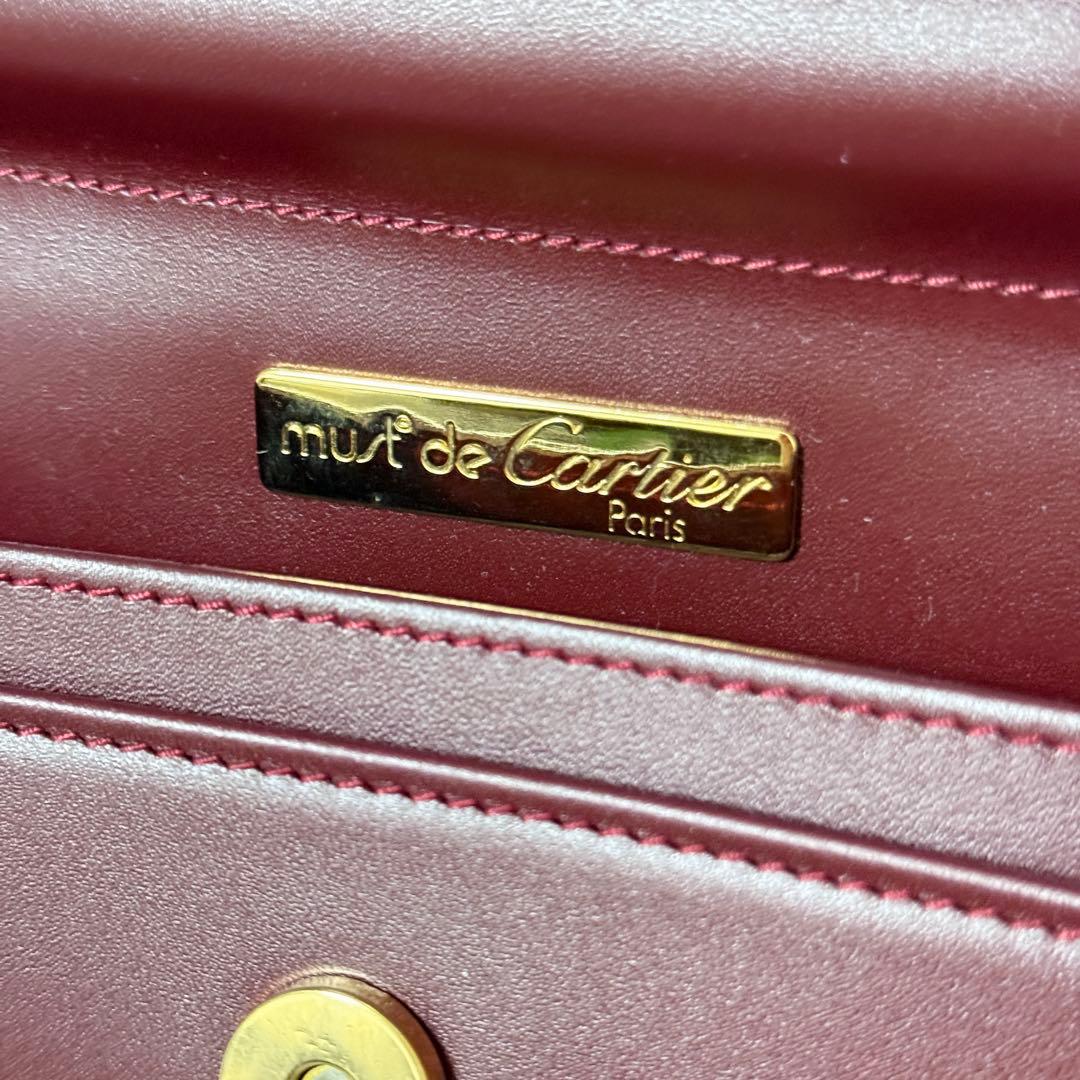 カルティエ　Cariter　マストライン　クラッチバッグ　ボルドー　ロゴ金具