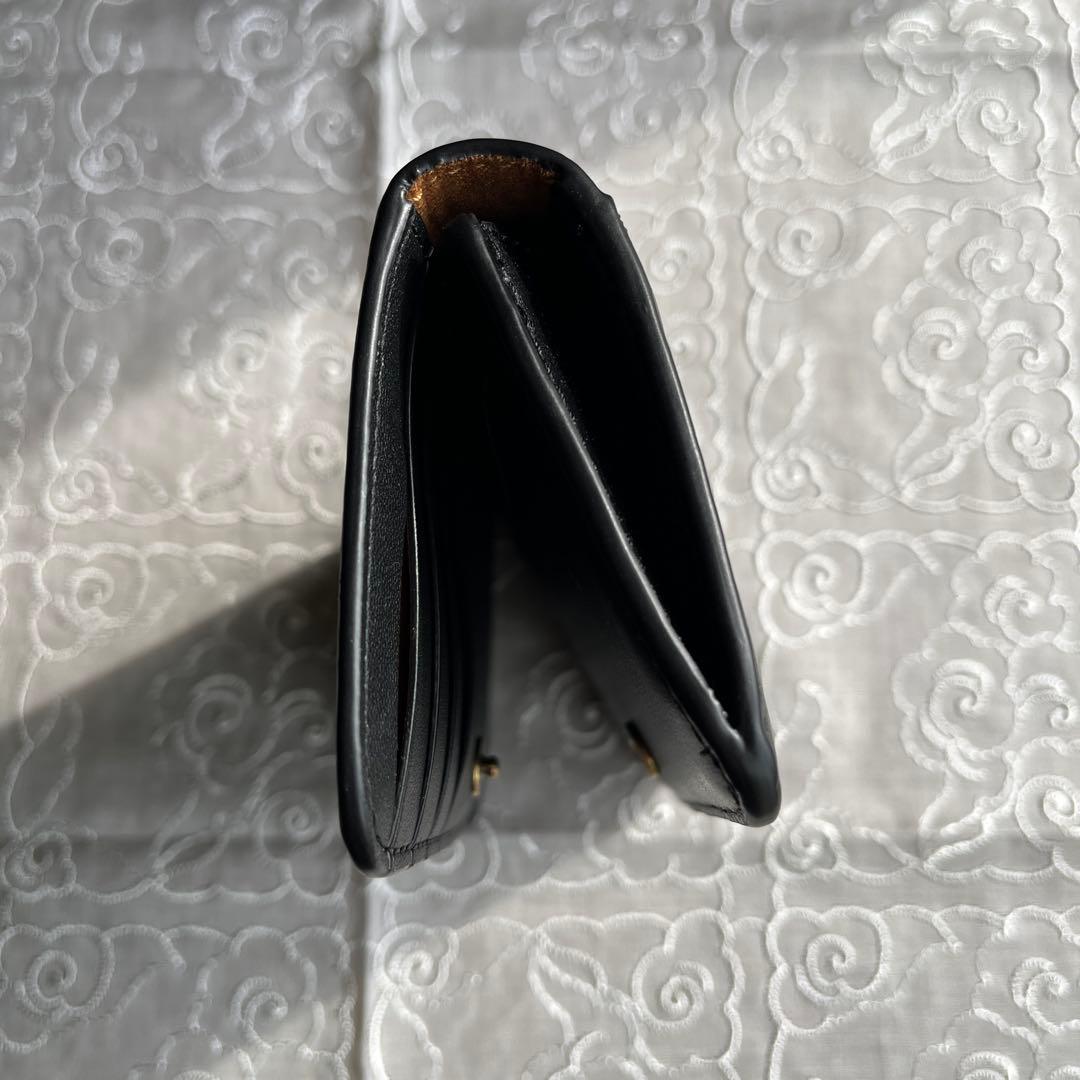 COACH 二つ折りミニ財布