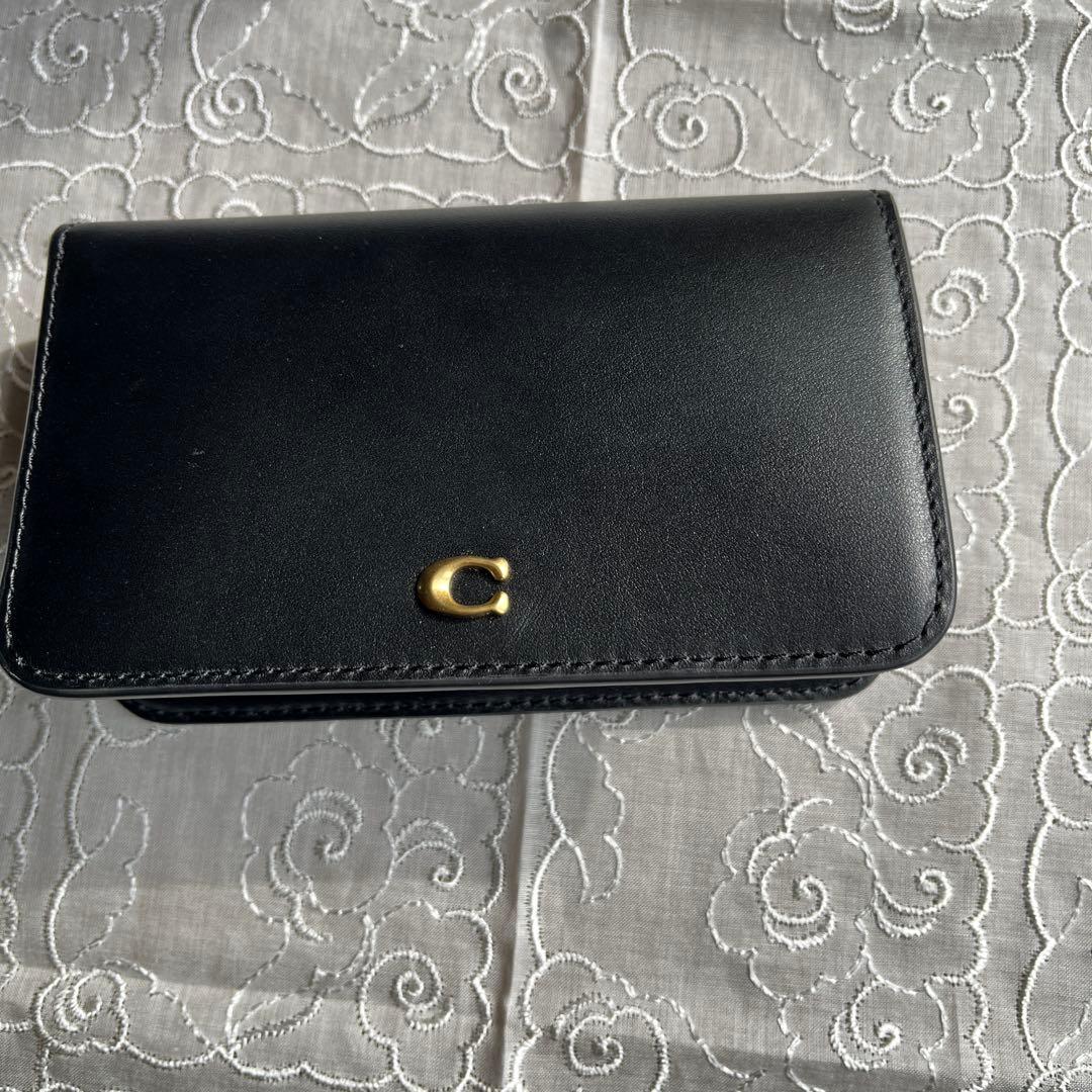 COACH 二つ折りミニ財布