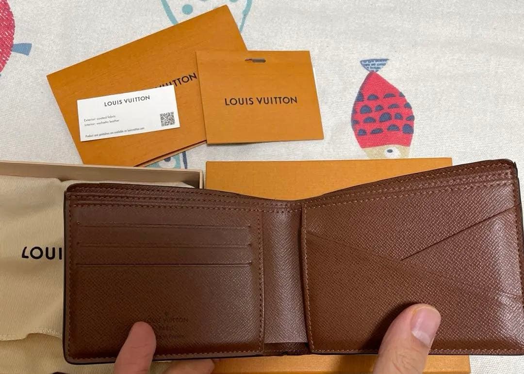 M*e様 Louis Vuitton モノグラム 二つ折り財布