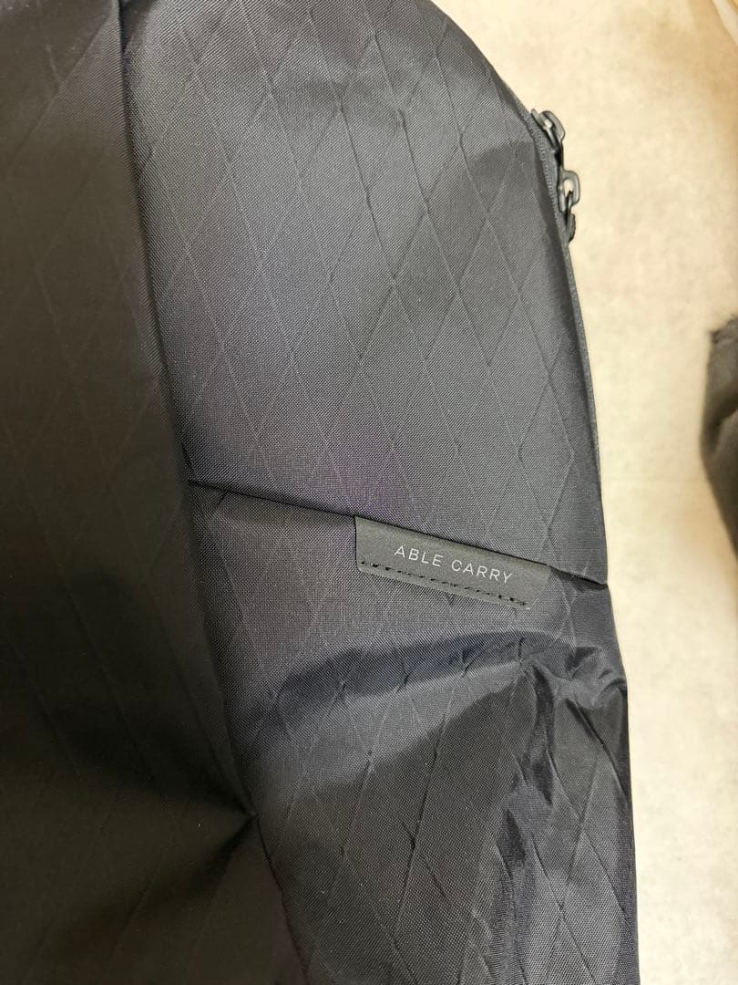 バッグ ABLE CARRY Thirteen Daybag X-Pac Black