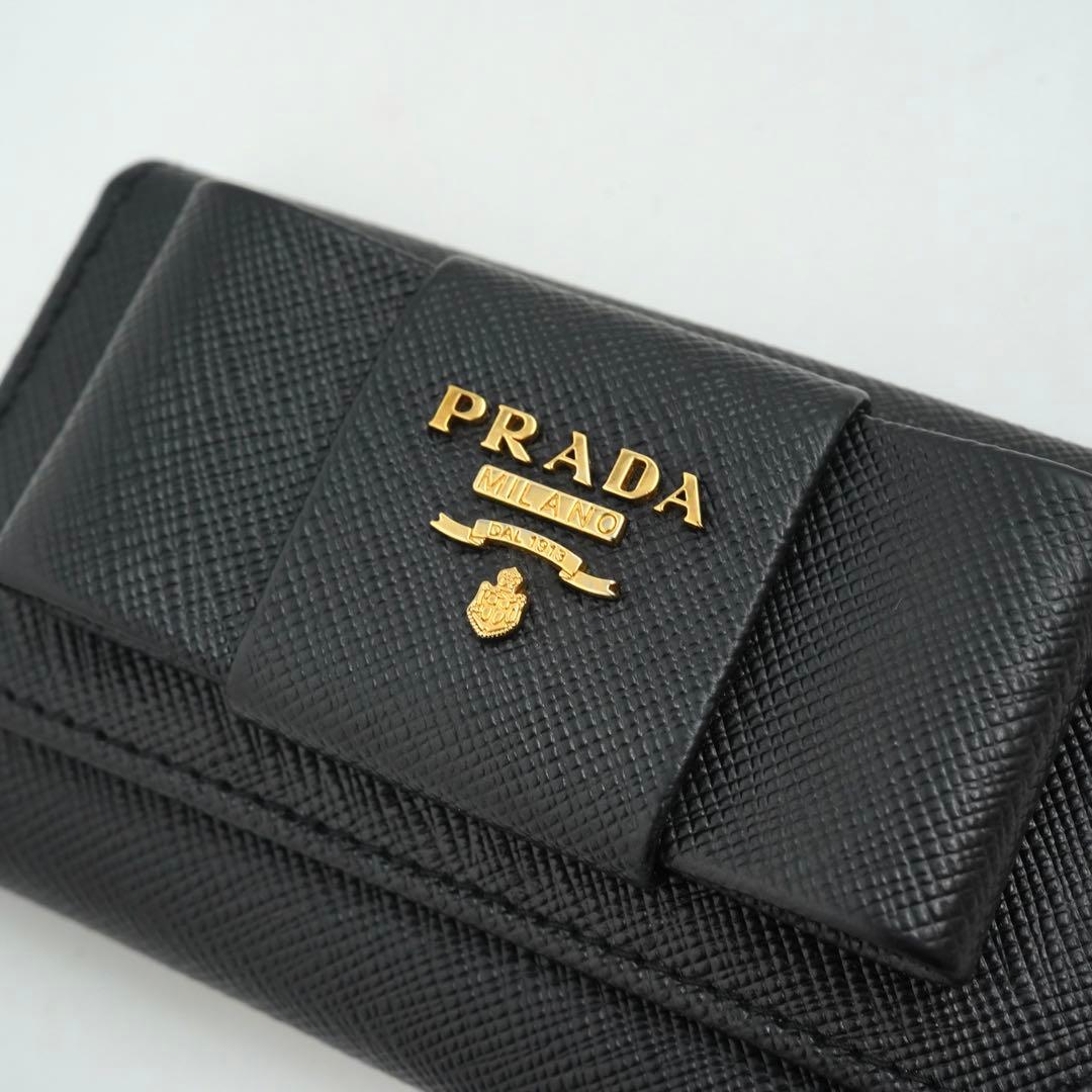✨新品未使用・箱保証書付き✨　PRADA キーケース　サフィアーノ　リボン　6連