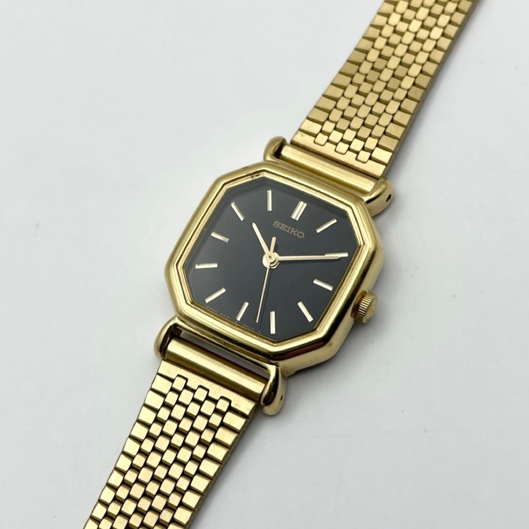セイコー レディース腕時計 ゴールド オクタゴン ブラック文字盤 クォーツ 稼働