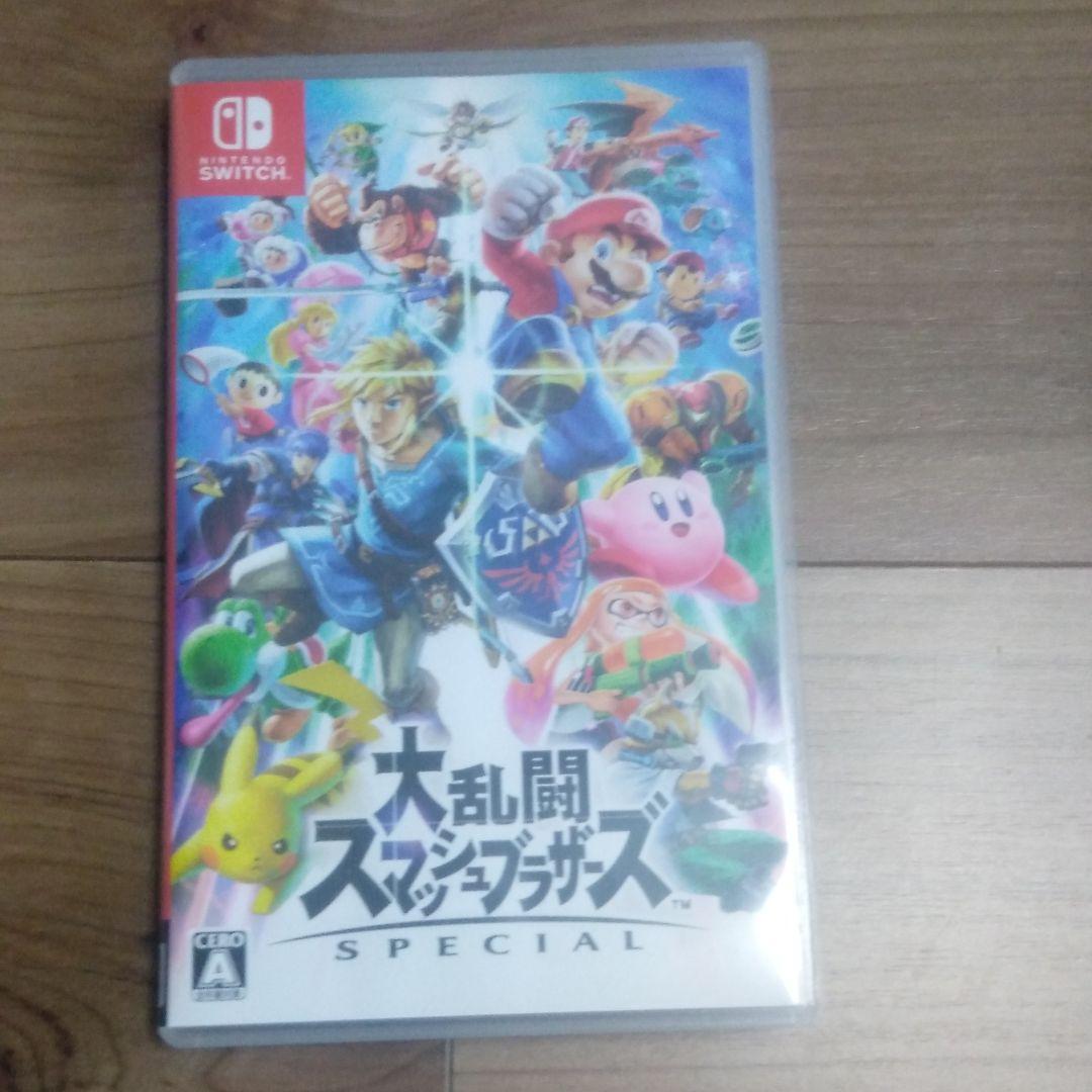 スイッチ本体とプロコンとスマブラソフト、スタンド付き