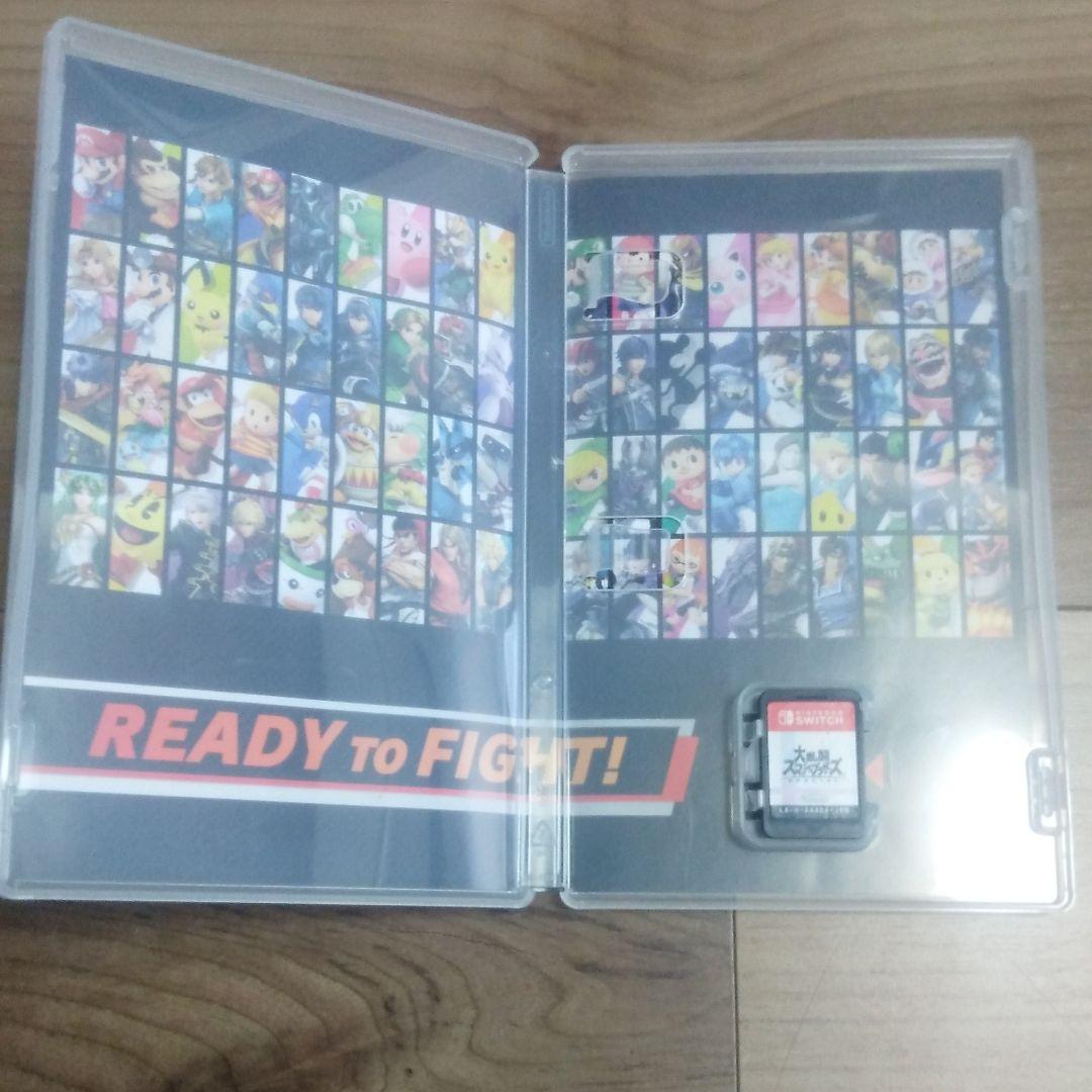 スイッチ本体とプロコンとスマブラソフト、スタンド付き