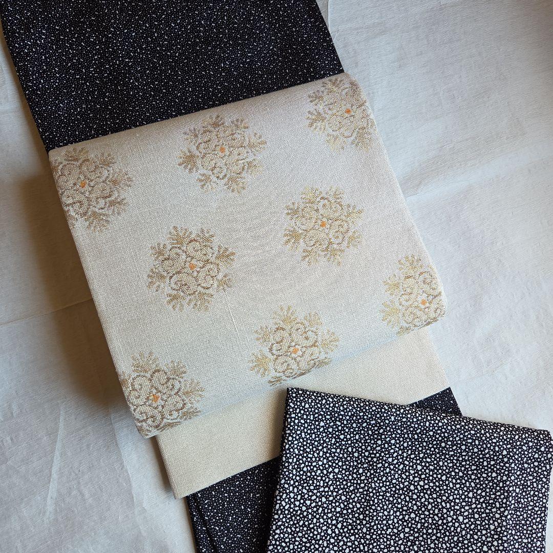 上品な織と煌めき　華文様の袋帯