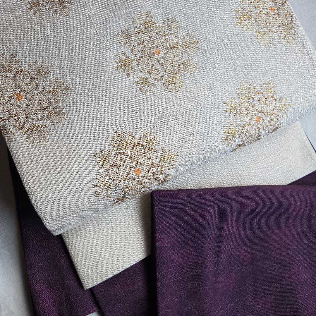 上品な織と煌めき　華文様の袋帯