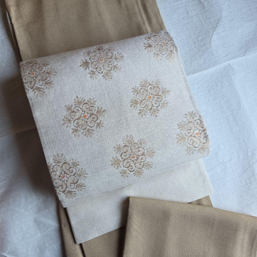 上品な織と煌めき　華文様の袋帯