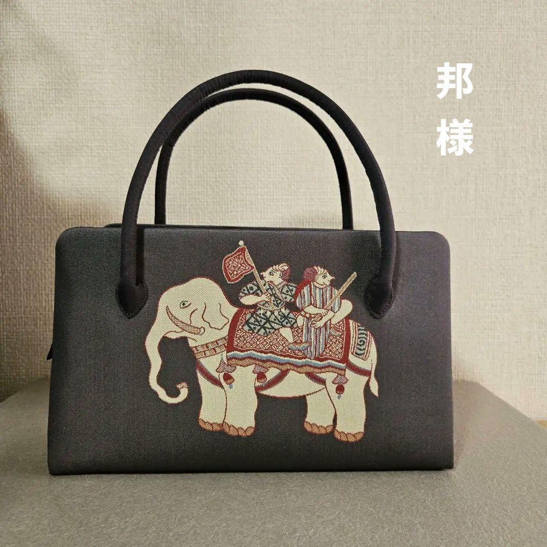 西陣縦錦の帯地を使用したバックと三分じめ(写真6)