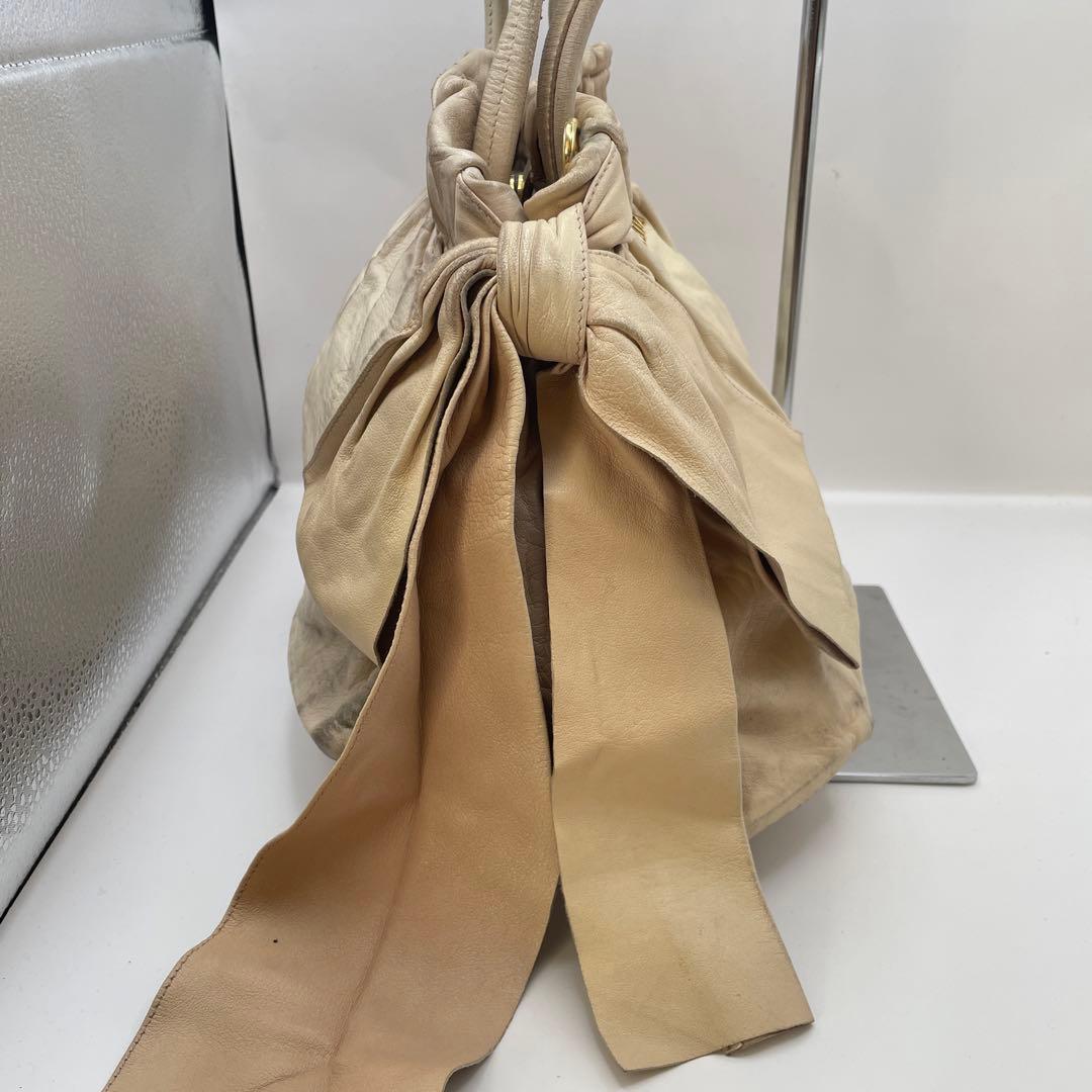 ジャンク特価✨ プラダ ナッパレザー サイドリボン トートバッグ ベージュ