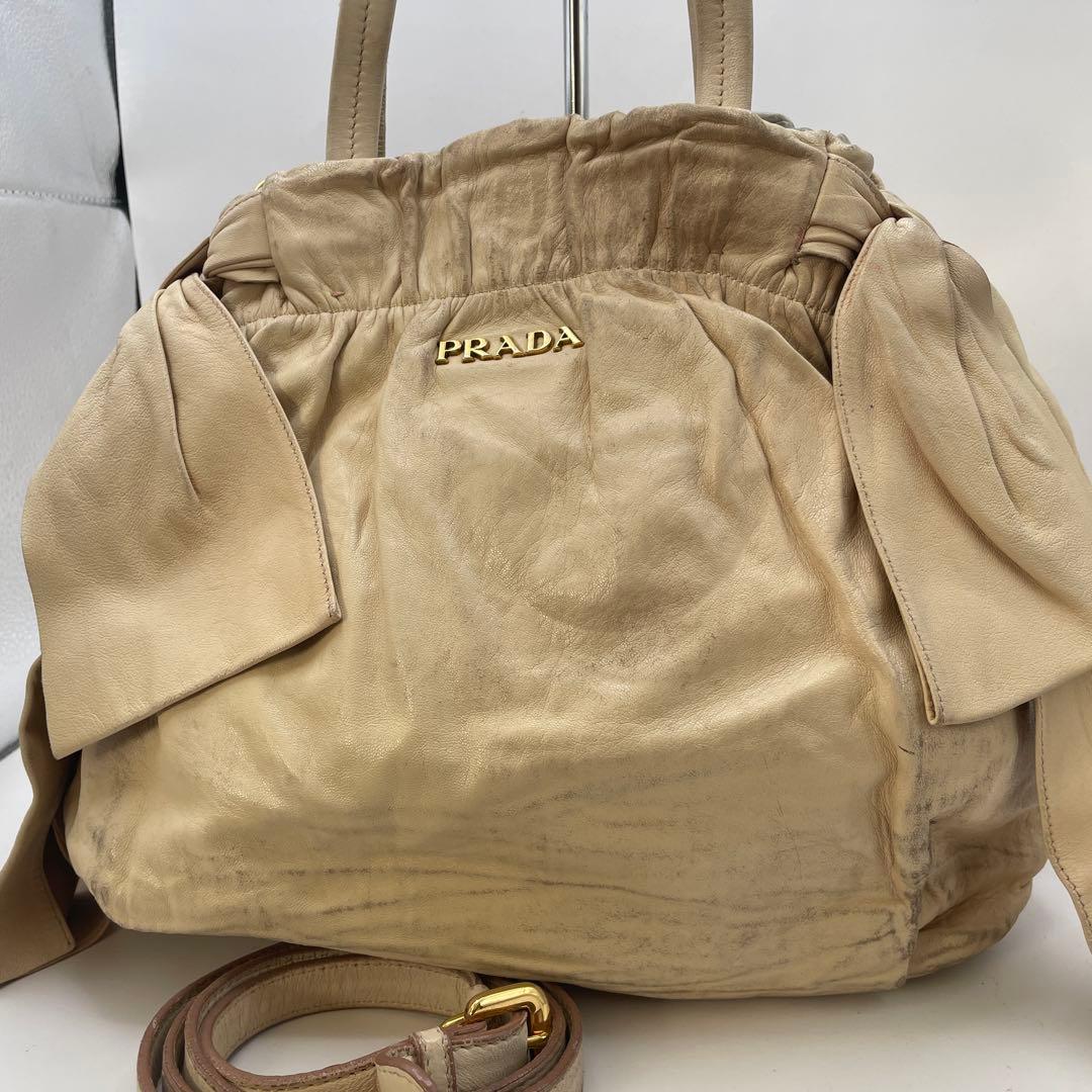 ジャンク特価✨ プラダ ナッパレザー サイドリボン トートバッグ ベージュ