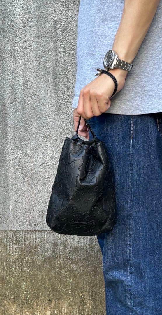レザー巾着　クロスパッチ、キルティング、総柄