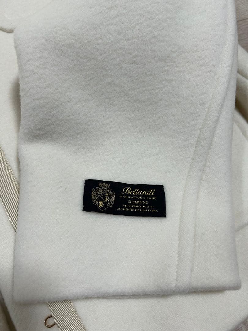 カデュネ　ノーカラーポケットコート　白