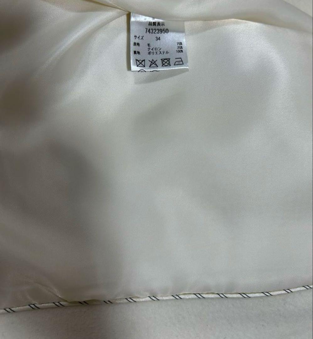 カデュネ　ノーカラーポケットコート　白