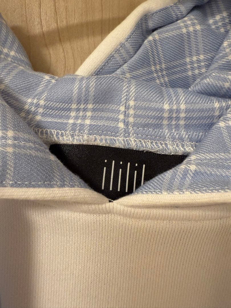 ililil フリル付きチェックパーカー