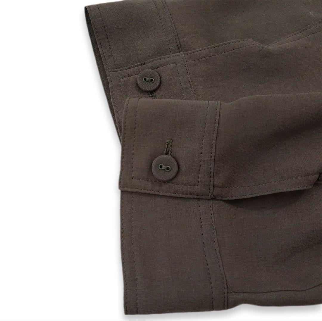 TOKUKO 1er VOL バックボタン 刺繍チュニックブラウス