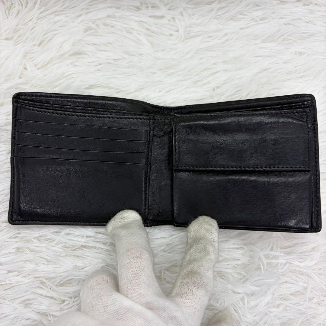 美品✨サンローラン　二つ折り　折り財布　カサンドラ　金ロゴ　レザー　ブラック